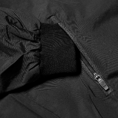 Shop Adsum Half Zip Popover Jacket In Black