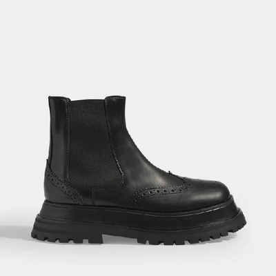 Shop Burberry Guideport Platform Ankle Boots In Black Calf Leather