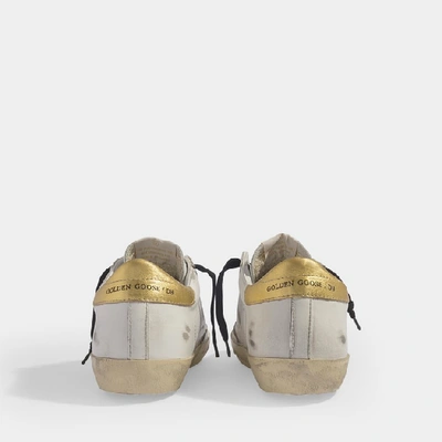 Shop Golden Goose Superstar Trainers In White And Gold Leather With Leopard Printed Star