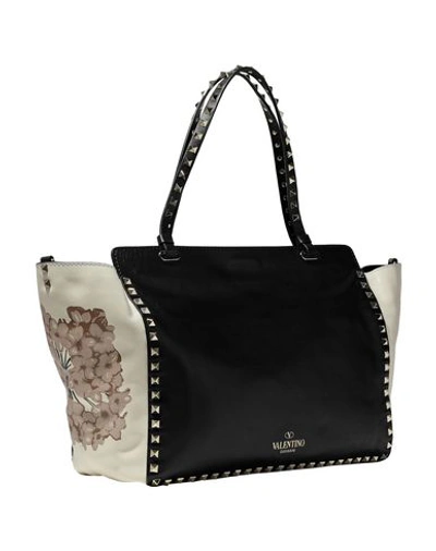 Shop Valentino Handbag In Black