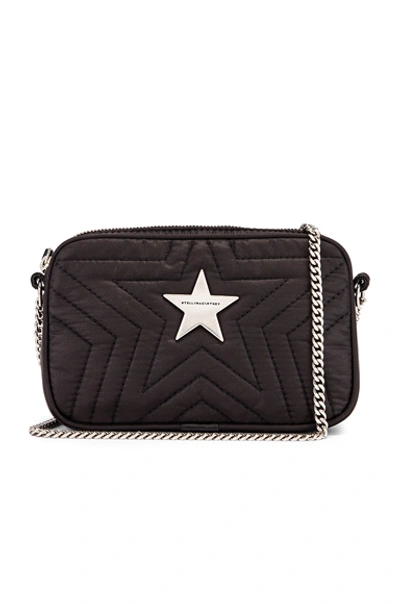 Shop Stella Mccartney Mini Star Crossbody Bag In Black
