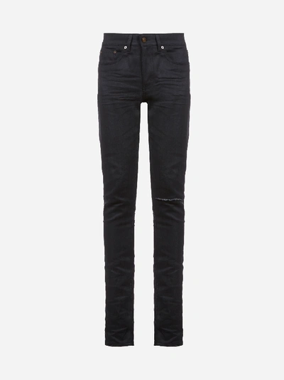 Shop Saint Laurent Jeans Skinny In Denim Con Taglio Al Ginocchio