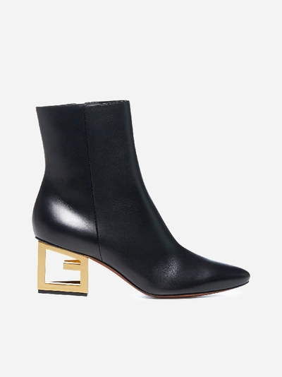 Shop Givenchy Triangle Leather Ankle Boots With G Heel