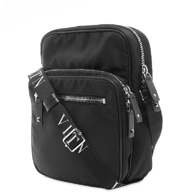 Shop Valentino Vltn Cross Body Bag In Black