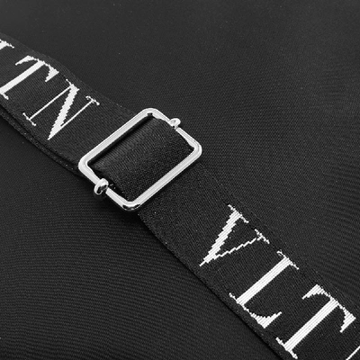 Shop Valentino Vltn Cross Body Bag In Black