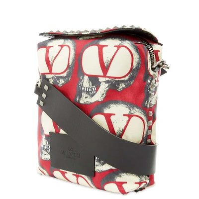 Shop Valentino X Undercover Repeat Skull Print Cross Body Bag In Red