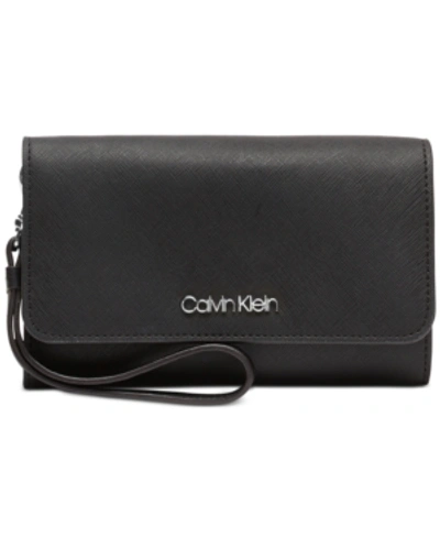 Shop Calvin Klein Saffiano Leather Wristlet In Black/silver