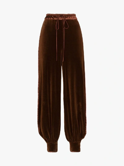 Shop Gucci Logo Velour Sweatpants In Brown