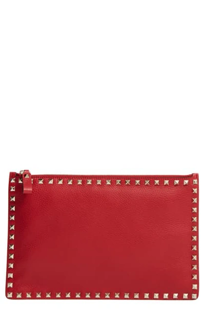 Shop Valentino Large Rockstud Pebbled Leather Pouch - Red In Rosso