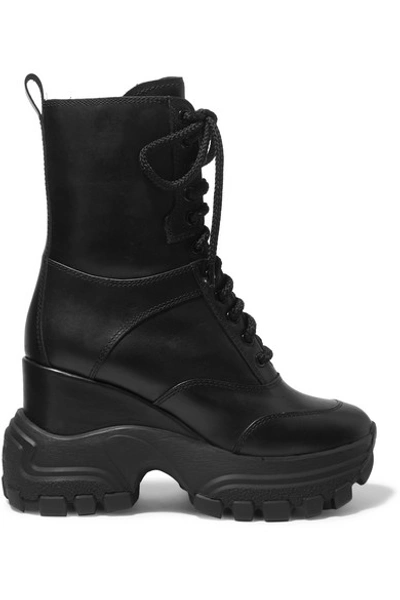 Shop Miu Miu Leather Platform Ankle Boots In Black