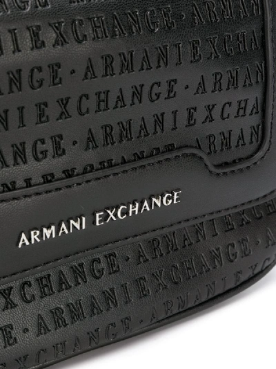 Shop Armani Exchange Lettering Embossed Cross-body Bag In Black