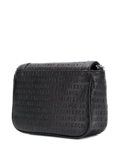 Shop Armani Exchange Lettering Embossed Cross-body Bag In Black