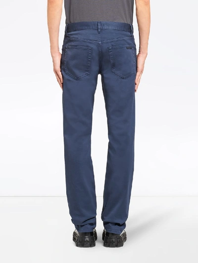 Shop Prada Low-rise Tapered Jeans In Blue