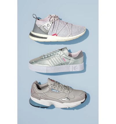 Shop Adidas Originals Falcon Sneaker In White Tint/ Raw White/ Pink