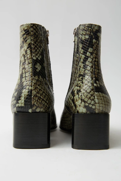 Shop Acne Studios Snake Print Boots Dusty Green