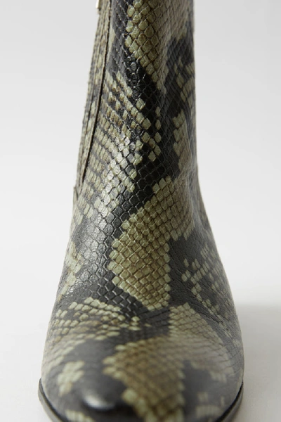 Shop Acne Studios Snake Print Boots Dusty Green