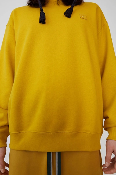 Shop Acne Studios Oversized Sweatshirt Amber Yellow