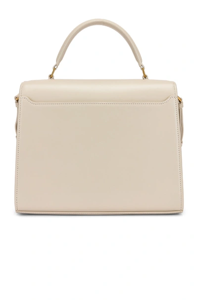 Shop Saint Laurent Medium Monogramme Cassandra Shoulder Bag In Crema Soft & Rouge Legion