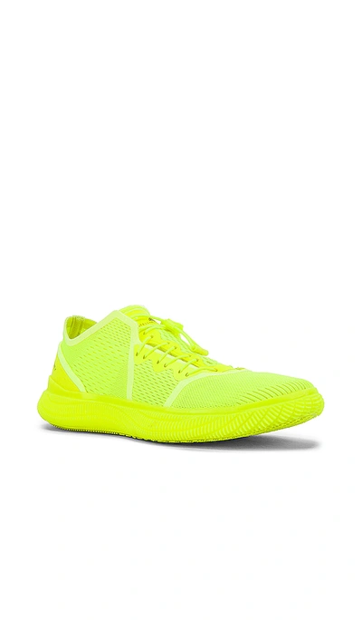 Shop Adidas By Stella Mccartney Pureboost Trainer Sneaker In Solar Yellow & Cream White