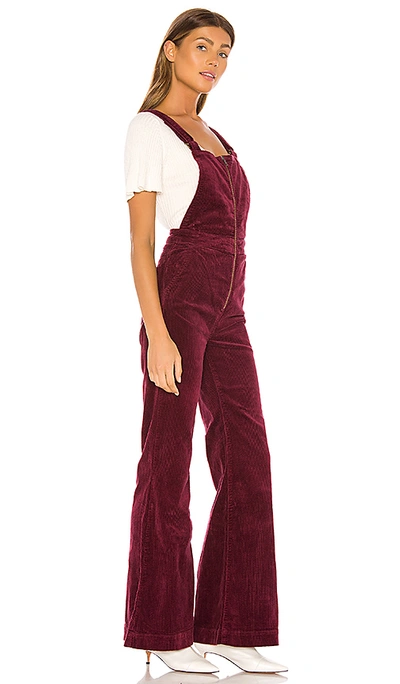 Shop Rolla's Eastcoast Corduroy Flare Dungaree In Bordeaux Cord