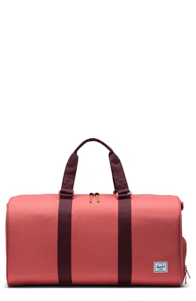 Shop Herschel Supply Co Novel Duffle Bag - Red In Mineral Red/ Plum