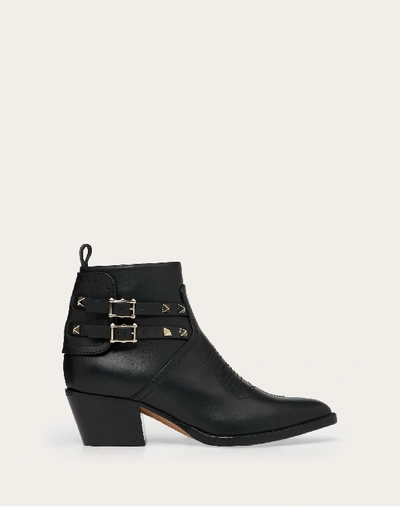 Shop Valentino Garavani Rockstud Calfskin Leather Cowboy Ankle Boot 50 Mm In Black