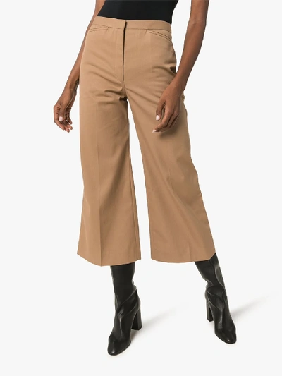Shop Lemaire Wide Leg Cropped Cotton Trousers In Brown