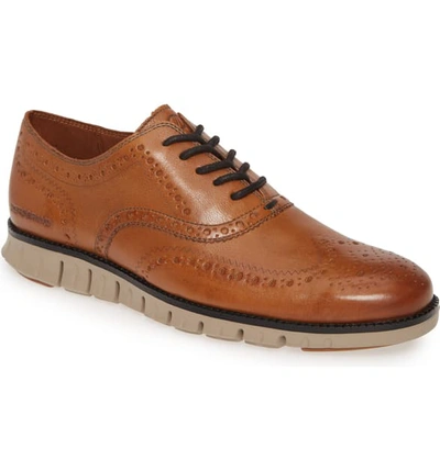 Shop Cole Haan Zerogrand Wingtip Derby In Burnished British Tan Leather