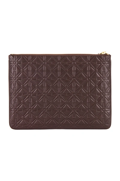 Shop Comme Des Garçons Star Embossed Pouch In Brown