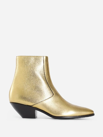 Shop Saint Laurent Boots In Gold