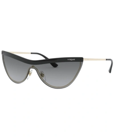 Shop Vogue Sunglasses, Vo4148s 39 In Black/pale Gold/grey Gradient