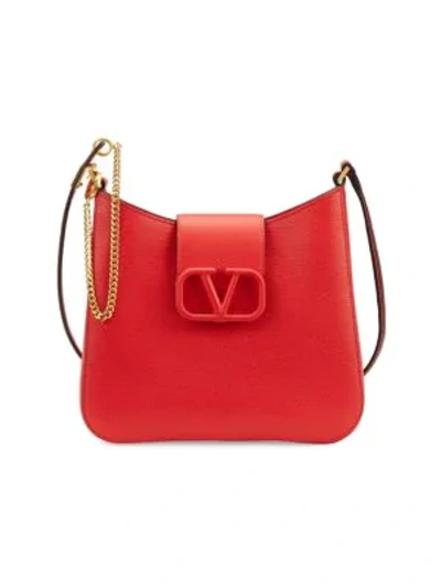 Shop Valentino Garavani Small Vsling Leather Hobo Bag In Rouge