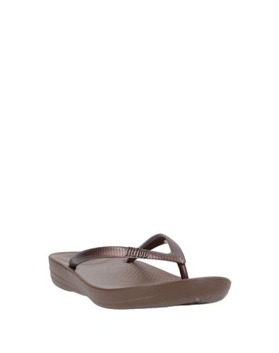 Shop Fitflop Flip Flops In Bronze