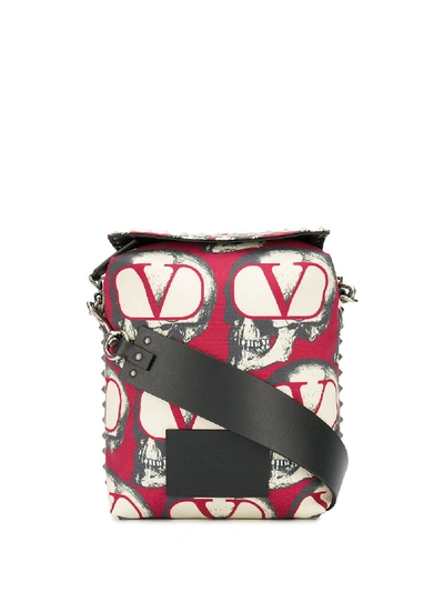 Shop Valentino Printed Cross Body Bag In Black