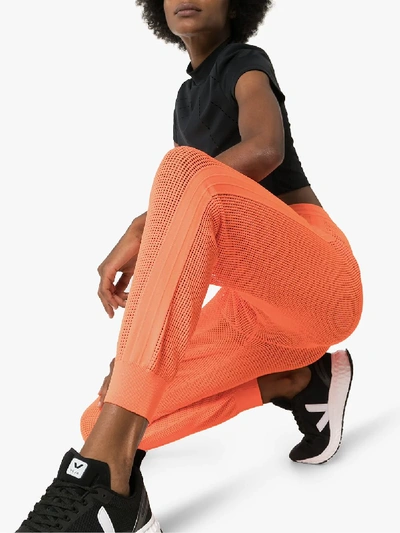 Shop Adam Selman Sport Mid Rise Mesh Track Pants In Orange