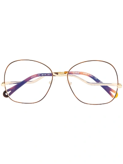Shop Chloé Thin Round Frame Glasses In Gold