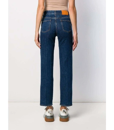 Shop Stella Mccartney Embossed Logo Straight Leg Jeans In Blue