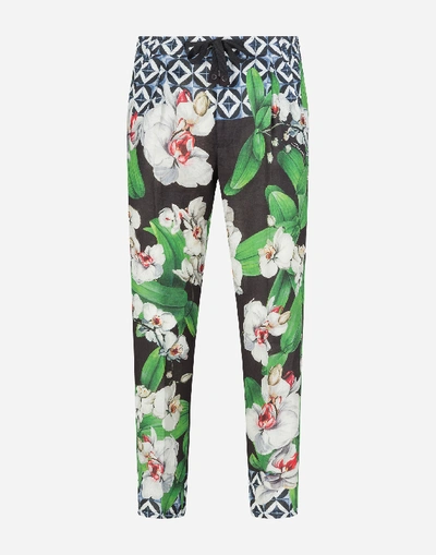 Shop Dolce & Gabbana Linen Jogging Pants With Orchid Print In Floral Print