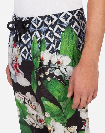 Shop Dolce & Gabbana Linen Jogging Pants With Orchid Print In Floral Print