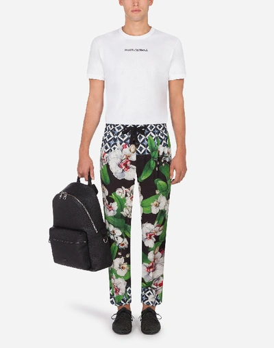 Shop Dolce & Gabbana Linen Jogging Pants With Orchid Print In Floral Print