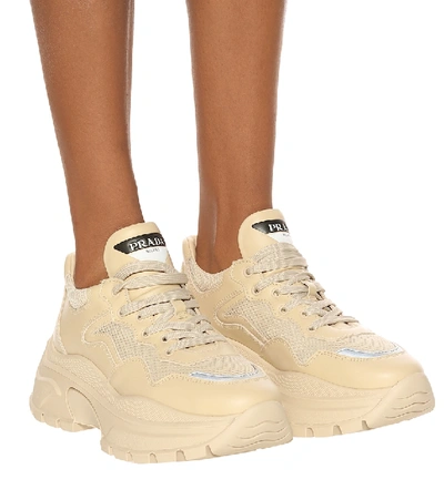 Shop Prada Centaurus Leather Sneakers In Beige