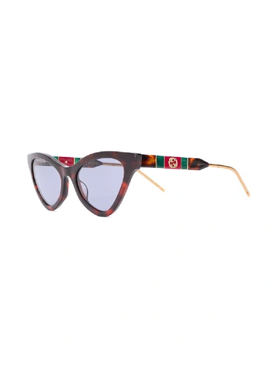 Shop Gucci Sunglasses In Beige