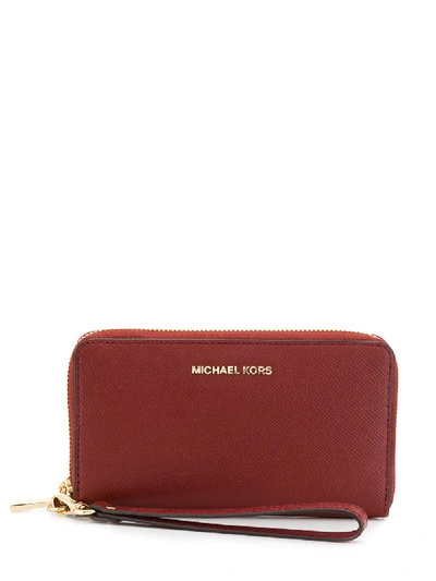 Shop Michael Michael Kors Jet Set Leather Phone Case In Red