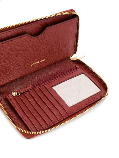 Shop Michael Michael Kors Jet Set Leather Phone Case In Red