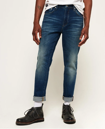 Shop Superdry Conor Taper Jeans In Blue