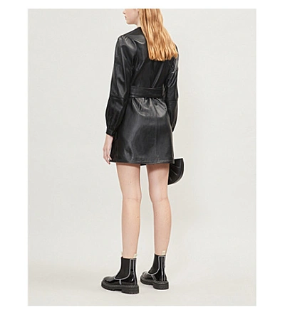 Shop Maje Wrap-around Leather Mini Dress In Black