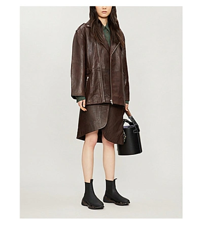 Shop Ganni Buckled Oversized Leather Biker Jacket In Chicory Coffee