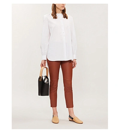 Shop Theory Snap-fastened Leather Leggings In Cognac