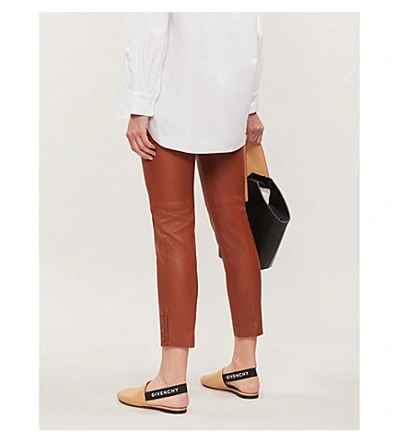 Shop Theory Snap-fastened Leather Leggings In Cognac