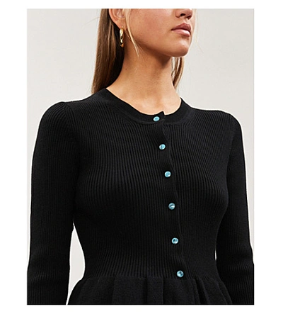 Shop Sandro Peplum Button-through Knitted Cardigan In Black
